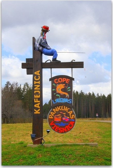 Kafejnīcas Cope ceļa zīme